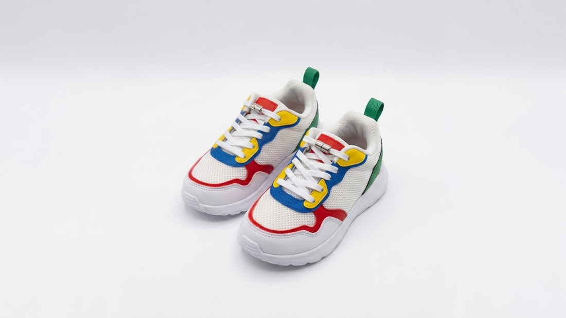 Colourful kids sneakers with elastic no-tie laces and silver metal capsule lock